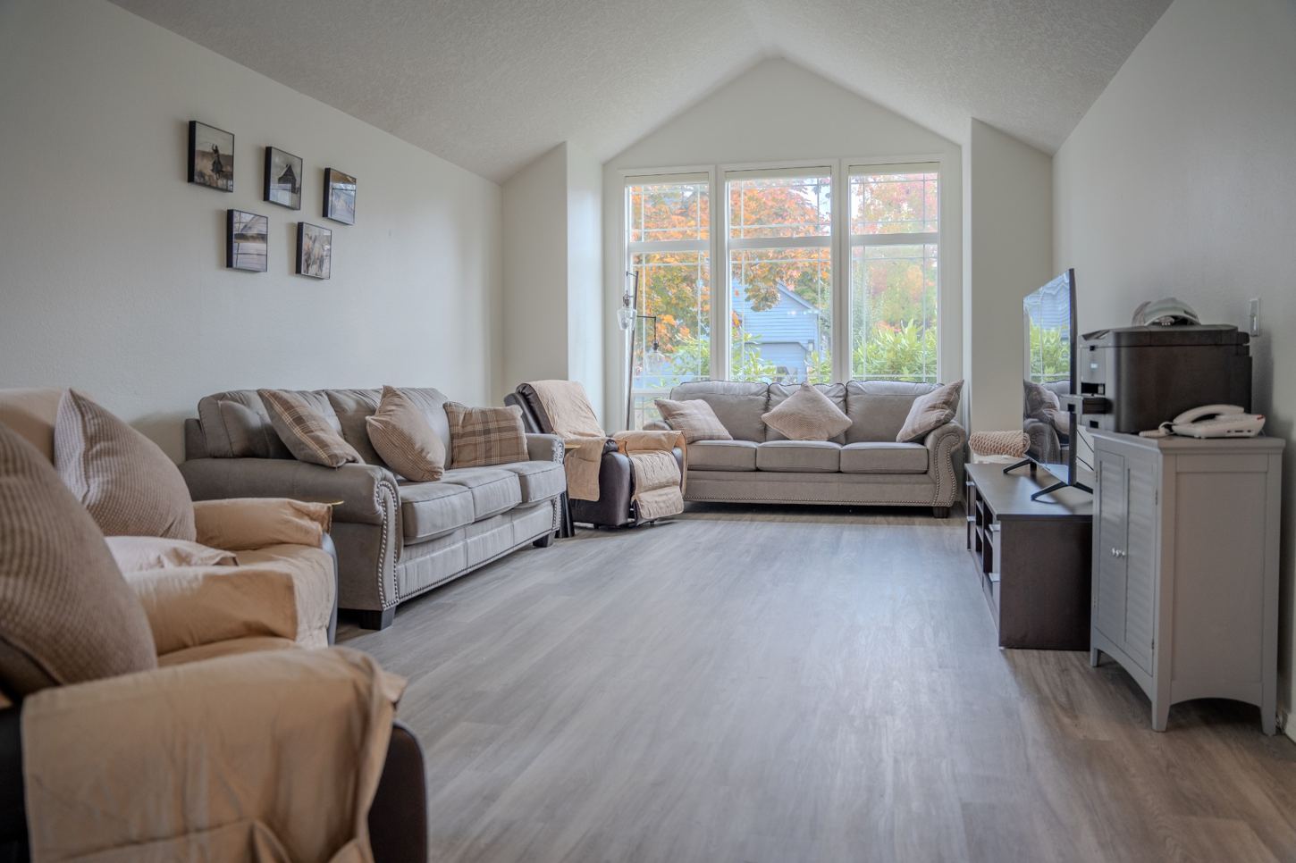 Comfortable living room with seating and large windows